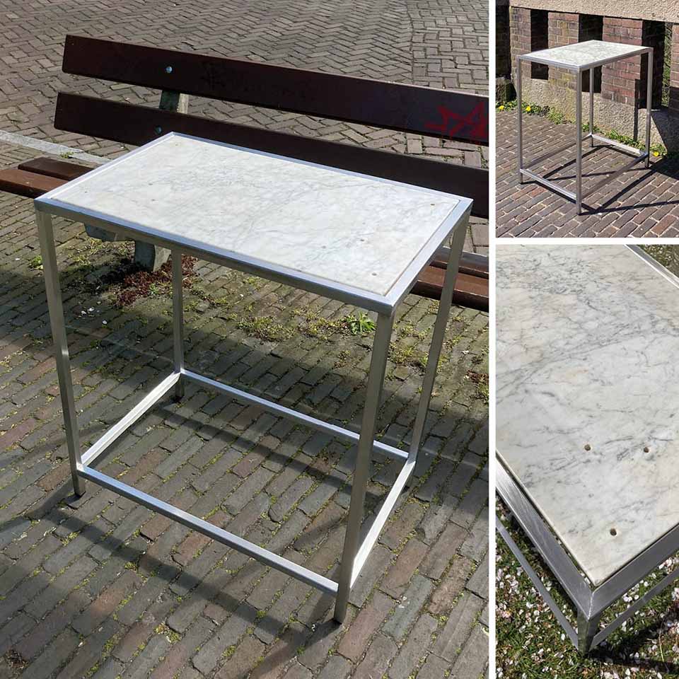 Rectangular outdoor table with marble top - stainless steel and reclaimed marble plate of a washbasin - by Erik Cox